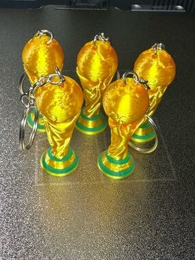 Set of 5 mini FIFA World Cup 2" trophy keychains is perfect for fans, collectors